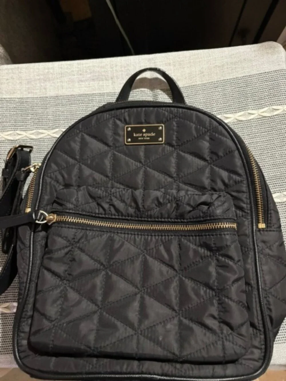 Kate Spade mini, quilted, black backpack. Excellent condition.